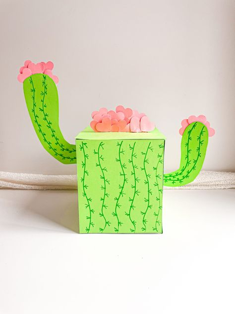 There are just so many creative Valentine’s boxes and guess what… I’ve got another Valentine’s box coming your way! This one is a bit different that the Hot Air Balloon box but just as easy and just as fun! I... Read More The post Cactus Valentine Box appeared first on Lifestyle with Leah. Cactus Valentines Day Boxes, Diy Valentines Mailbox, Girl Valentine Box Ideas For School, Valentine’s Day Boxes Ideas, Cute Valentines Box Ideas, Valentine’s Day Boxes, Valentines Boxes For Kids School, Valentine Box Ideas For School, Diy Valentine's Mailbox