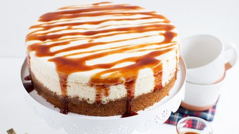 This layered creamy, dreamy RumChata™ cheesecake with a Cinnamon Toast Crunch™ cereal crust and a gooey cinnamon drizzle is a guaranteed party showstopper. Cinnamon Drizzle, Rum Chata, Make Sour Cream, Favorite Christmas Desserts, Coconut Dessert, Crunch Cereal, Hot Buttered Rum, Cinnamon Toast Crunch, Gateaux Cake