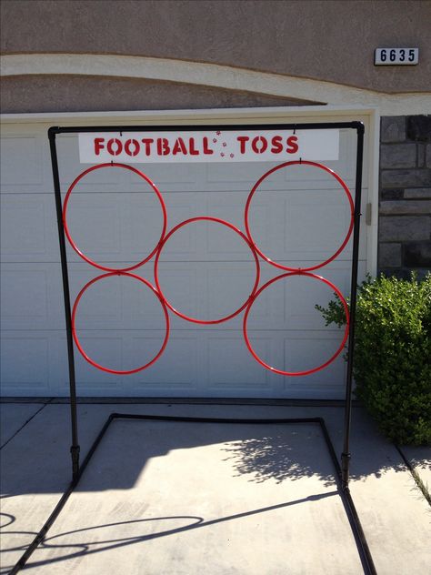 Football Toss school carnival game. Frame made out of pvc pipe and the rings are hoola hoops zip tied to frame. The kids loved it! Carnival Games Halloween Theme, Carnival Party Games Diy, Town Festival Ideas, School Carnival Booth Ideas, Easter Carnival Games, Diy Carnival Games For Kids, Carnival Games Diy, Spring Festival Ideas, Cheap Carnival Games