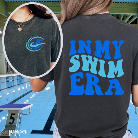 "In My Swim Era Comfort Colors Shirt, Swim Shirt Era Shirt, Swim Season Shirt, Swimming Team Shirt, Swim Squad... Comfort Colors introduces the \"Comfort Colors 1717\" garment-dyed t-shirt; a fully customizable tee made 100% with ring-spun cotton. The soft-washed, garment-dyed fabric brings extra coziness to your wardrobe while the relaxed fit makes it an excellent daily choice. The double-needle stitching throughout the tee makes it highly durable while the lack of side-seams helps the shirt re Funny Swim Shirts, Competitive Swimming Aesthetic, Swim Team Shirts Design, Swim Tshirt, Summer Swim Team, Swim Team Shirts, Swim Team Gifts, Sport Outfit Women, Swimming Team