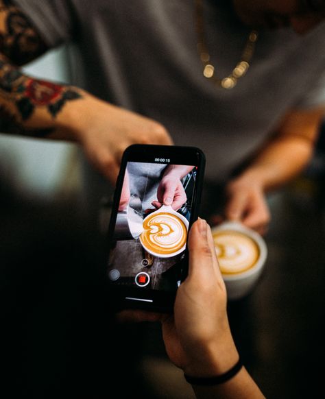 It takes a team. Tattoos and tulip latte art through the phone. Coffeeshop Photography Ideas, Starbuck Photography Ideas, Latte Photography, Coffee Shop Ambience Photography, Specialty Coffee Photography, Sons Of Liberty, Sunrise Coffee, Coffee Photo, Coffee Shop Photography