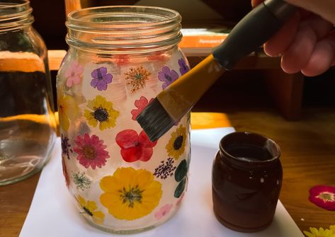 How to Make Pressed Flower Lanterns to Celebrate the Summer Solstice – Herbal Academy Pressed Flower Lanterns, Fall Mason Jar Crafts, Herbal Academy, Decorative Glass Jars, Solstice Celebration, Pressed Flower Crafts, Celebration Around The World, Mason Jar Flowers, Jar Lanterns