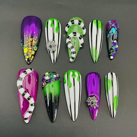 Unleash your style with our Beetle Juice 2 inspired press-on nails! These custom, reusable press-ons add a bold, quirky touch to your look. Perfect for a spooky, stylish vibe! 🌸Thank you for supporting my small business.🌸 You can reuse all the nails you purchased from us multiple times, if you handle them with care 📦𝐖𝐡𝐚𝐭 𝐜𝐨𝐦𝐞𝐬 𝐰𝐢𝐭𝐡 𝐲𝐨𝐮𝐫 𝐩𝐫𝐞𝐬𝐬 𝐨𝐧 𝐧𝐚𝐢𝐥 𝐤𝐢𝐭? 10 𝘯𝘢𝘪𝘭𝘴 𝘰𝘧 𝘺𝘰𝘶𝘳 𝘴𝘪𝘻𝘦 24 𝘢𝘥𝘩𝘦𝘴𝘪𝘷𝘦 𝘴𝘵𝘪𝘤𝘬𝘴 1 𝘯𝘢𝘪𝘭 𝘧𝘪𝘭𝘦 1 𝘤𝘶𝘵𝘪𝘤𝘭𝘦 ? Green Halloween Nail Art, Nettle Juice Nails, Beetlejuice Nails Almond, Beetlegeuse Nails, Bettle Juice Nail Ideas, Beetlejuice Nail Designs, Halloween Nails Beetlejuice, Beetle Nails, Beetlejuice Nail Art