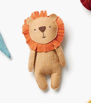 How To Make A Hand Sewn Felt Lion Hand Sewn Animals, Hand Sewn Stuffed Animals, Felt Lion, Lion Fabric, Nursery Sewing, Lion Stuffed Animal, Hand Sewn Felt, Handmade Stuffed Animals, Sewing Projects For Kids