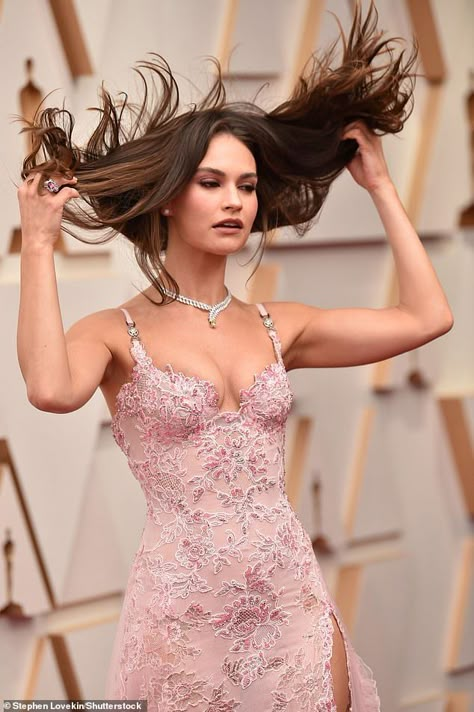 Oscars 2022: Lily James puts on leggy display on red carpet in daring pink lace dress Lily James Oscar Dress, Lily James Oscars 2022, Lily James Pink Dress, Oscars 2022, Versace Gown, Oscars After Party, Pink Lace Dress, Lily James, Prom Dress Inspiration