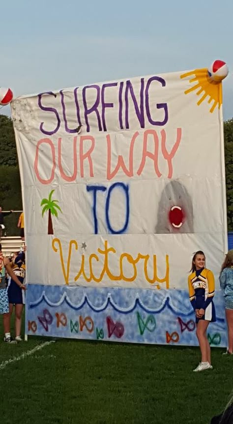 Beach Theme Run Thur Beach Cheer Theme, Homecoming Float Themes Ideas, Homecoming Float Ideas Theme, Beach Themed Football Signs, Beach Theme Run Through Sign Football, Beach Theme School Spirit, Beach Homecoming Float, We Run This Beach Football Poster, Hawaiian Run Through Signs Football