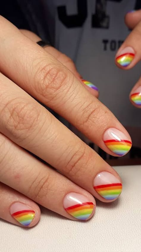 Whether male, female, cis, queer, or gender fluid, these rainbow nail designs are a chance to explore a world of color.   #PRIDE Ombre Pride Nails, Pride Dip Powder Nails, Pride Nail Art Short Nails, Pride Short Nails Designs, Pride Pedicure Ideas, Pride Toenails, Pride Month Nail Ideas, Pride Nails Designs Simple Short, Rainbow Gel Nails Short