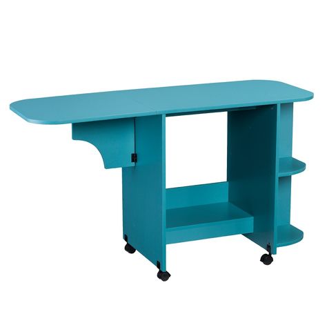 Let your creativity shine with the Aiden Lane Expandable Rolling Sewing Table/Craft Station. A spacious shelf and four cubbies provide storage for yarn, fabric swatches, or scissors, while a convenient drop-leaf tabletop expands or folds to fit your project. Roll this mobile organizer into your living space to create arts and crafts with the family, or station in your dedicated work area to keep sewing essentials and patterns neat and tidy. Bring order to your creative space with this versatile Home Office Craft Room, Turquoise Desk, Wood Desk Top, Sewing Desk, Campaign Desk, Side Shelves, Room Supplies, Craft Station, Craft Desk