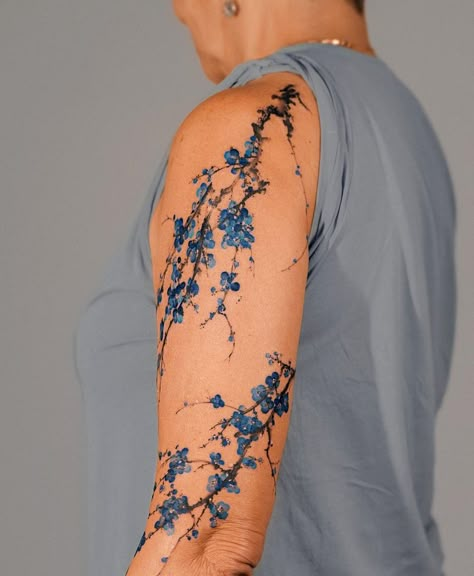 Blue Leg Tattoo, Blue Sakura Tattoo, Black And Blue Ink Tattoo, Blue Tattoos On Brown Skin, Blue Cherry Blossom Tattoo, Tattoo For Dogs, Dark Blue Tattoo, Wait Tattoo, Flower Tattoos Men