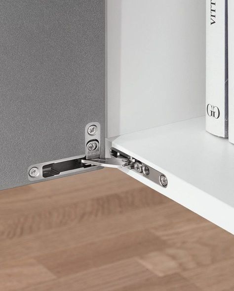 The Salice Air Hinge is groundbreaking. Mortised into both the cabinetry and the door it closes, this hinge delivers full functionality in a stylish, discreet package. Fully adjustable in three directions by way of an eccentric cam, the Air features integrated soft close and is ideal for high-end kitchens, bathrooms, living- and bedroom furniture and display cabinets. Wardrobe Hinges, Furniture Hinges, Cabinetry Hardware, Hinges For Cabinets, High End Kitchens, Concealed Hinges, Display Cabinets, Strawberry Fields, Corporate Office