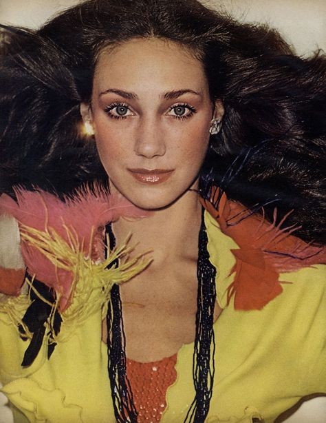 Marisa Berenson modern as tomorrow, yet she thrives on seclusion and sentiment: Marisa in Stephen Burrows's feathered jacket and sequined dress. Photo by Helmut Newton. Vogue, December 1973. 70s Celebrities, Marisa Berenson, Feather Jacket, Helmut Newton, Dress Photo, Sequined Dress, Simple Image, Vintage Beauty, Vintage Photography