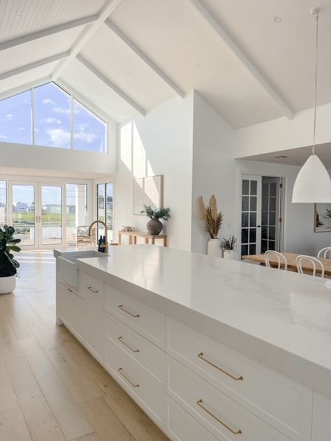 No. 05 Torquay House - Kennedy & Co Interiors Large Kitchen With High Ceilings, Modern Beach House Lighting, Beach House Modern Kitchen, Dream Home Kitchen Modern, Kitchen With Raked Ceiling, Exposed Beams Ceiling Lighting, Kitchen With Exposed Beams, Home Reno Ideas, Modern Kitchens 2024