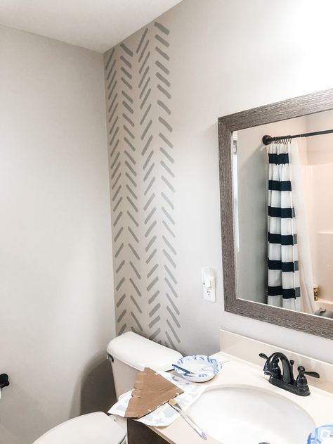 DIY hand painted accent wall (and a paint thinning hack!) Herringbone Wall Paint, Hand Painted Accent Wall, Diy Herringbone Wall, Painted Accent Wall, Herringbone Stencil, Chris Traeger, Geometric Wall Stencil, Accent Wall Stencil, Herringbone Wall