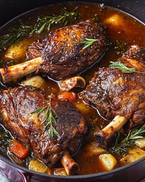 Tender Slow-Cooked Lamb Shanks simmered in a rich, herb-infused gravy for a comforting, flavorful meal perfect for cozy dinners. Braised Lamb Shanks Recipe, Lamb Shanks Slow Cooker, Slow Cooked Lamb Shanks, Lamb Shank Recipe, Goat Recipes, Lamb Dinner, Braised Lamb Shanks, Lamb Shank, Lamb Chop Recipes