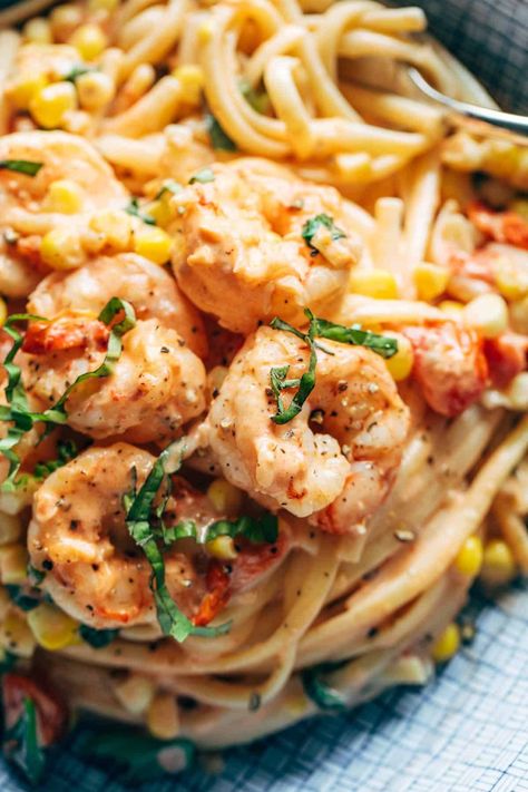 Creamy Shrimp Pasta with Corn and Tomatoes! A seriously delicious fresh summer pasta. Creamy, silky noodles, garlicky shrimp, and a punch of fresh corn, cherry tomatoes, and basil. #pasta #summer #corn Pasta With Milk, Pasta With Corn, Pasta Summer, Garlicky Shrimp, Pasta Creamy, Creamy Shrimp Pasta, Pinch Of Yum, Corn Pasta, Creamy Shrimp