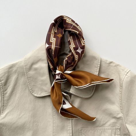 Effortlessly elevate your autumn outfit with a timeless silk scarf. Versatile, stylish, and comfortable, it's the perfect accessory to add a touch of elegance and sophistication to your year-round wardrobe. #LuluLaneUK #70ssoul #neckerchief #classicfashionstyle #autumnoutfit #WardrobeEssentials #accessoriesoftheday #slowfashionstyle #DapperGent #timelessfashion #ootdinspo #giftforhim #semiformalwear #RefinedElegance #scarfstyle #StylishMen #SophisticatedStyle #preppyfashion #cocktailpartywea... Men Silk Scarf Style, Men’s Tie, Silk Neck Scarf Outfit, Scarf Photoshoot, Scarf Outfit Men, Scarves Design, Mens Scarf Fashion, Mens Silk Scarves, Silk Scarf Style