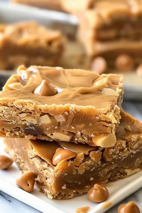 Golden peanut butter cookie bars studded with chocolate chips. Lunch Ladies Peanut Butter Bars, Peanut Butter Lunch Lady Cookie Bars, Peanut Butter Cookie Bars Recipes, Lunch Lady Recipes, Easy Squares, Chocolate Chips And Peanut Butter, Sweets Board, Butter Cookie Bars, Peanut Butter Bar