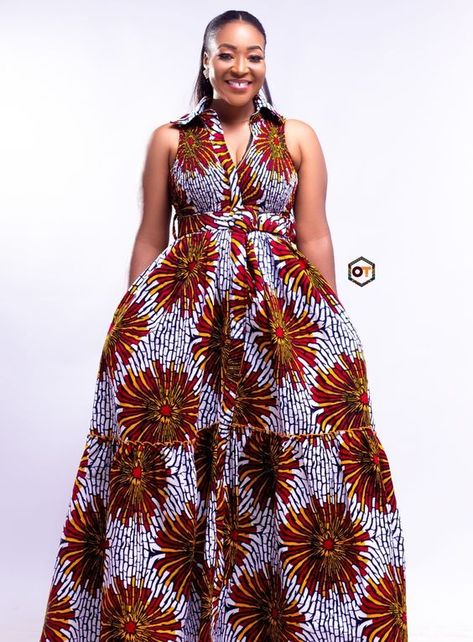 Our sensational Zame dress is a must have. This strapless maxi dress is what your closet has been missing. The upper part of the dress is sewn with elastic and can be worn with the zip up or down or styled differently with a belt. This beautiful floor length dress has 2 bottom layers. From the vibrant print to the beautiful floor length layer details, its sure to make you love every detail!  Description * Strapless Maxi dress * 2 Layer Floor length detail. * Maxi length. * 100% Cotton f... Maxi Gown Styles, Ankara Maxi Gown, African Print Maxi Dress, Kitenge Designs, African Fabric Dress, Long African Dresses, African Print Dress Ankara, African Dresses Modern, Best African Dresses