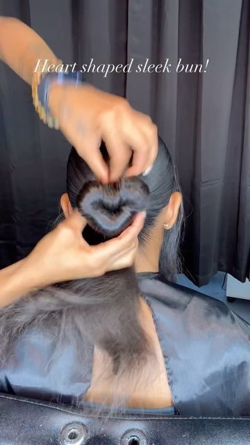 Heart Bun With Curls, Heart Bun With Swoop, Heart Shape Parts Hairstyles, Heart Bun With Bang, Heart Shaped Bun Tutorial, Two Heart Buns Hairstyle, Heart Shaped Buns Hair, How To Do A Heart Bun, How To Do Heart Buns