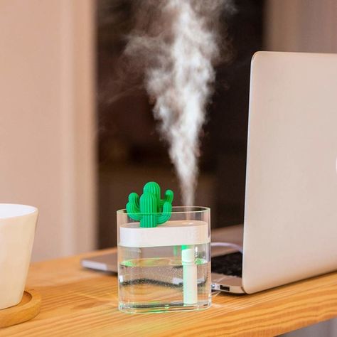 A smol USB-powered humidifier to keep dry air and overactive radiators from ruining your peaceful day. Poster Architecture, Mini Diffuser, Portable Humidifier, Crystal Power, Dry Air, Air Humidifier, Aroma Diffuser, Air Purifier, Water Tank