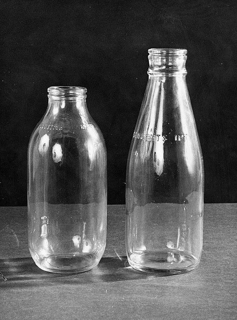 Milk bottles (1973) we used to have a metal box on the steps outside so the milkman could put the bottles inside and take his payments... The boxes were not  refrigerated! Kentucky Tourism, Old Milk Bottles, Retro Glassware, Vintage Milk Bottles, Child Hood, Childhood Memories 70s, Retro Photography, Milk Bottles, Heavy Heart