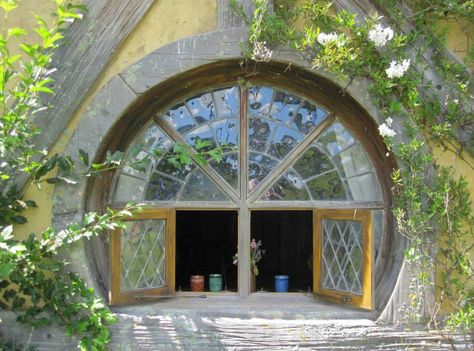 Hobbiton, New Zealand, Lisa Berry Hobbit Window, Circle Window Design, Hobbiton New Zealand, Hobbit Homes, Hobbit Holes, Circle Window, Earth Sheltered, Hobbit Hole, Cob House