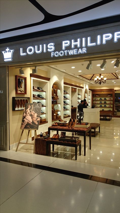 Louis Philippe footwear speacialty store design based on curated product positioning of brand. Louis Philippe, Retail Store, Store Design, Liquor Cabinet, Quick Saves, Home Decor, Design, Home Décor