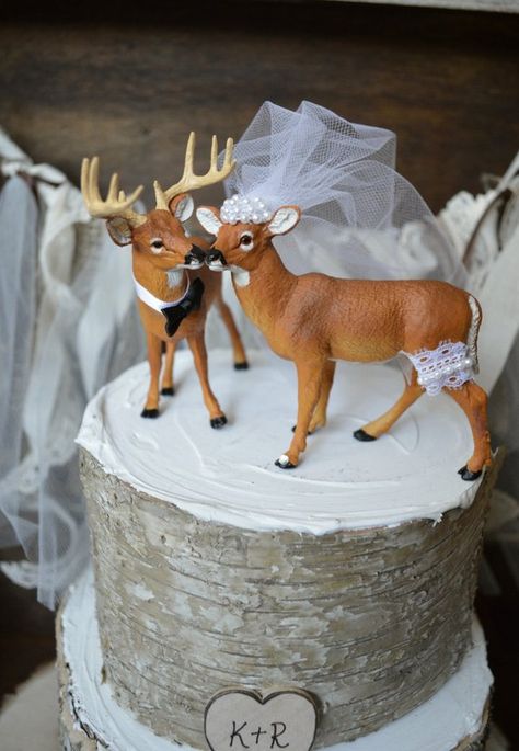 If you are a deer loving couple,love hunting,or just love the outdoors,than you will love this topper. The groom buck wears a white collar and simple black bow tie.The beautiful bride wears a pearl covered veil,matching garter on her leg,and signature rhinestone on her ring hoof. Hunting Wedding Cake Toppers, Hunting Wedding Cake, Hunting Cake Topper, Grooms Cake Toppers, Hunting Cake, Deer Cakes, Hunting Wedding, Deer Wedding, Ivory Bride