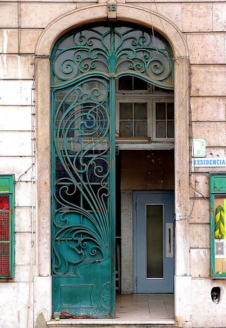 Art Nouveau | Photo by Arnim Schulz - Entrance to a restaurant in Lisbon, Spain.  Love the pantina to the metal work. Art Nouveau Doors, Art Nouveau Entrance, Art Nouveau Fence, Art Noveau Building, Art Nouveau Gate, Art Nouveau Doors Entrance, Art Nouveau Architecture Buildings, Art Nouveau Door, Art Nouveau Stained Glass Door