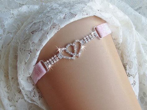 Double Heart Wedding Garter, Rhinestone Hearts Wedding Garter, Glam Hearts Garter, Double Heart Bridal Garter Set, Sparkle Keepsake Garter QUEEN SIZES AVAILABLE IN DROP DOWN MENU! Description: Keepsake wedding garter is 3.75 inches of rhinestone trim made of two rhinestone hearts entwined in the center of triple rows of rhinestone trim. Attached to 5/8 inch glitter on stretch elastic. It is shown in White AB and Pink AB. Can be purchased as a set of 2 for a keepsake and toss garter set. The pict Cute Garters Wedding, Heart Garter, Pink Thigh Garter, Red Bridal Garter, Unique Garter, Crystal Garter, Hearts Entwined, Rhinestone Garter, Leg Garter