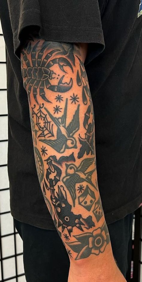 All Black American Traditional Tattoo, Traditional Tattoo Art Elbow, Knee Blaster Tattoo, American Traditional Nail Tattoo, Black And Grey Elbow Tattoo, American Traditional Tattoos On Dark Skin, Trad Wrist Tattoo, Men’s Traditional Arm Sleeve, Mens Filler Tattoo Ideas