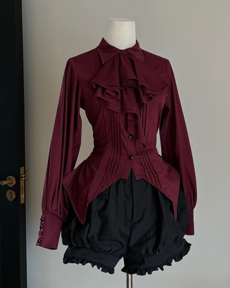 🛍️Gothic long sleeves shirt with pleating details in 3 colors& waistcoat with bat wings hemline design in 2 colors. 👉Search 'FLFYD-009' on devilinspired.com #devilinspired #gothic #gothicfashion #lolitafasion #lolitacoord #gothicshirt #waistcoat Dark Red Clothes Aesthetic, Red Goth Outfits, Gothic Clothes Women, Vampire Outfit, Gothic Elegance, Future Clothes, Gothic Clothes, Unique Top, Gothic Style