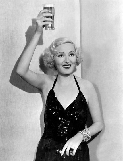 Peggy Hopkins Joyce, ex Ziegfeld Girl raises a glass to celebrate the end of prohibition. Raising A Glass Pose Reference, Assertiveness Training, 1930's Dress, End Of Prohibition, Bar Photos, Glass Of Beer, Ziegfeld Follies, Ziegfeld Girls, 20s Party