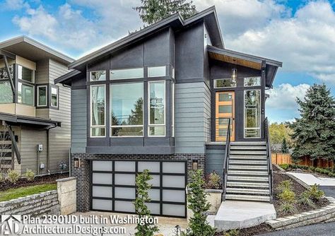 Cute and Cozy: Designing Your Perfect Tiny House Drive Under Garage House Plans, Narrow Lot House Plans With Garage, Narrow Homes, Modern Siding, Narrow Lot House, Narrow Lot House Plans, Narrow House, Siding Materials, Contemporary House Plans