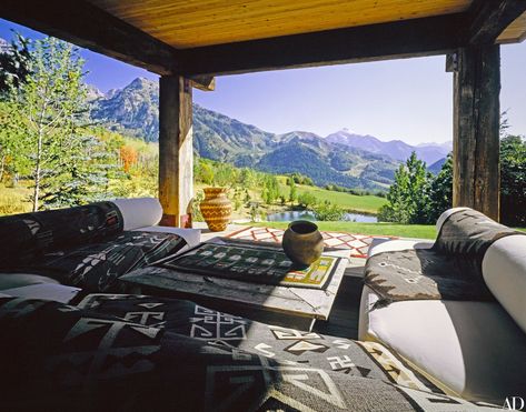 A pavilion by his house overlooks a landscape Redford has compared to Africa. His collection of Native American artifacts includes a Teec Nos Pos rug, foreground, circa 1900; a 1920s Navajo diamond-patterned rug, on ledge; and a Lukachukai Yei rug, circa 1950, at right. Sundance Utah, Sundance Resort, Log Cabin Kits, Cabin Kits, Room Screen, Robert Redford, Celebrity Houses, Back To Nature, Robert Downey Jr