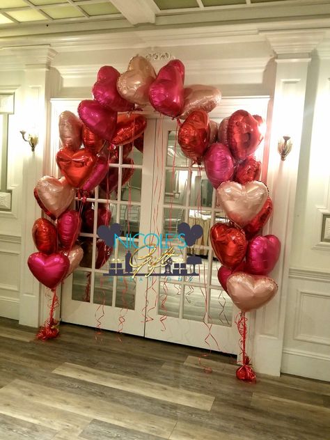 Arch of Hearts by Nicole's Gift Creations...heart balloon decor Valentine’s Day Church Decor, Heart Balloon Decorations, Heart Balloon Decor, Valentine’s Day Balloon Decor, Dance Decorations School, Valentines Day Balloon Decorations, Balloon Heart Wall, Valentines Day Balloon Arch, Valentine’s Day Dance Decorations