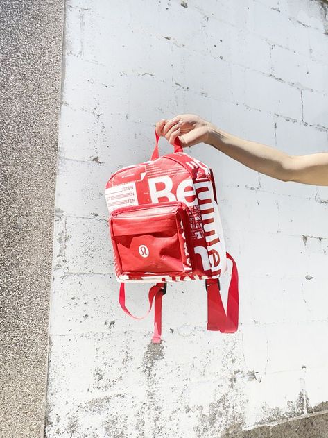 hand holding a backpack made out of Lululemon shopping bags. This is an uncycled sewing project Cute Backpack, Old Clothes, Cute Backpacks, Traditional Fashion, Cambridge Satchel Company, How To Sew, Outdoor Wear, Fjallraven Kanken Backpack, 귀여운 동물