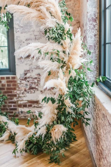 Pampas Grass Arbor Decor, Ferns With Pampas, Pampas Greenery Wedding, Pampas Grass Installation, Pampas And Greenery Centerpiece, Pompadour Grass Wedding, Pampas And Greenery Wedding, Pampas Grass Swag, Pampas Grass Arbor