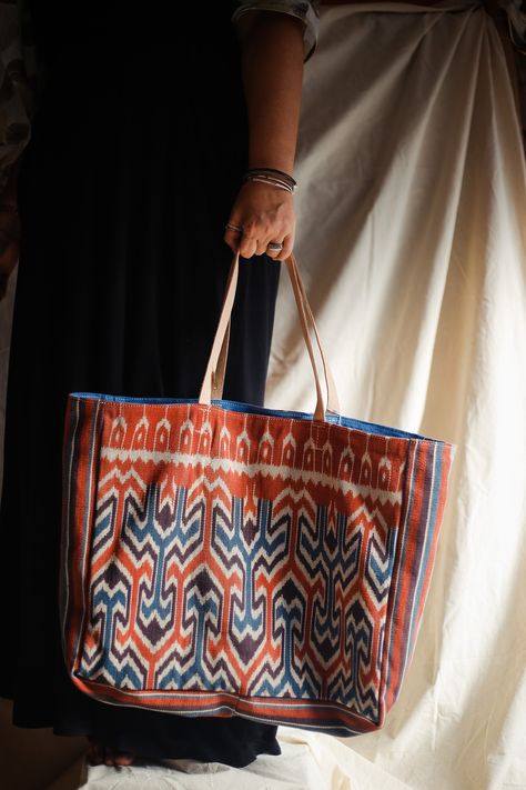 This bag is reversible to suit your mood and we have used a handspun natural dyed vcloth that blends with the Sulawesi ikat. You will be surprised what you can fit in this robust bag and look elegant. Size: 47 x 19 x 40 cm / 18.5 x 7.5 x 15.5 in Purchase: https://www.threadsoflife.com/product/lontar-collection-bagj31swbixxxx018/ Uzbek Ikat, Diy Makeup Bag, Ikat Bag, Tenun Ikat, Ethnic Bag, Diy Makeup, Market Bag, Ethical Fashion, Natural Dyes