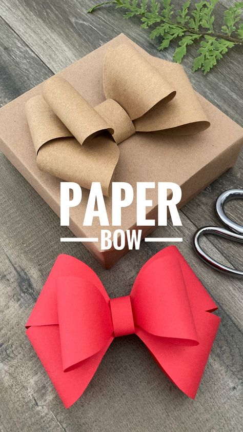 Add a touch of handmade charm to your gifts with a spectacular paper bow! Full video viewable through link. ❤️ . . . #paperbow #diybow #papercrafts #christmas #christmascrafts #bow Creative Bows For Gifts, Bows On Presents Wrapping, Making A Bow With Wrapping Paper, Bow For Presents Diy, Present Ribbon Ideas, Ribbon Wrapping Ideas, Present Bows Diy Ribbons, Gift Topper Ideas, Wrapping Paper Bow