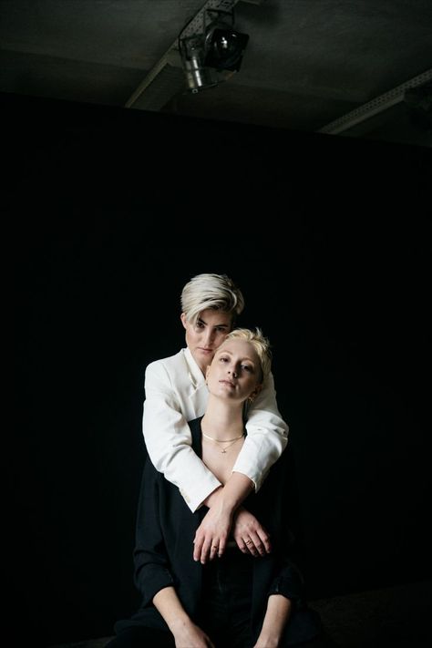 A minimalist and modern couple photoshoot, in a studio in Berlin for a lovely queer couple. #queercouple #nonbinary #loveislove #studiophotoshoot #wlw #couple #lovers Poses For Queer Couples, Lesbian Studio Portraits, Women Couple Photoshoot, Queer Photoshoot Ideas, Elvish Lord Of The Rings, Queer Photoshoot, Wlw Photoshoot, Curly Photoshoot, Couple Studio Photoshoot