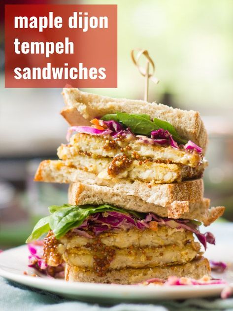 Crispy cornmeal crusted tempeh is drenched in sweet maple-Dijon sauce and stuffed into toasty bread with wasabi slaw to make these satisfying and scrumptious vegan tempeh sandwiches. Delicious, indulgent, and perfect for lunch or dinner! #veganrecipes #tempeh #vegansandwich Tempeh Sandwich, Vegan Tempeh, Vegan Sandwich Recipes, Vegan Beef, Tempeh Recipes, Nice Recipes, Vegan Lunch Recipes, Vegan Sandwich, Savory Vegan