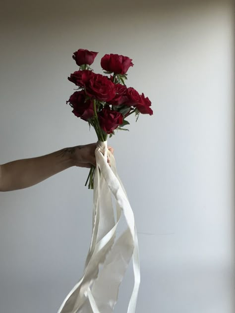 floral sculpture, still life. Auckland floral designer New Zealand, white and red floral arrangement, modern, wedding florist Auckland, Modern Wedding florals, Red rose bridal bouquet, flowing silk ribbon, modern bridal bouquet, en mass bridal bouquet, rose bridal bouquet, silk ribbon bridal bouquet Red Bouquet Roses, 9 Roses Bouquet, Wedding Red Roses Bouquet, Elopement Bridal Bouquet, All Rose Bridal Bouquet, Rose Flower Bouquet Aesthetic, All Red Bouquet, Modern Bouquet Wedding, Red Hand Bouquet Wedding