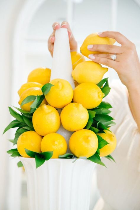 DIY Lemon Centrepieces - 3 Ways! — Home with Gabby Lemon Tablescape, Mom Brunch, Lemon Table Decor, Mediterranean Party, Lemon Centerpieces, Topiary Diy, Summer Boat, Lake House Food Ideas, Decorações Com Comidas