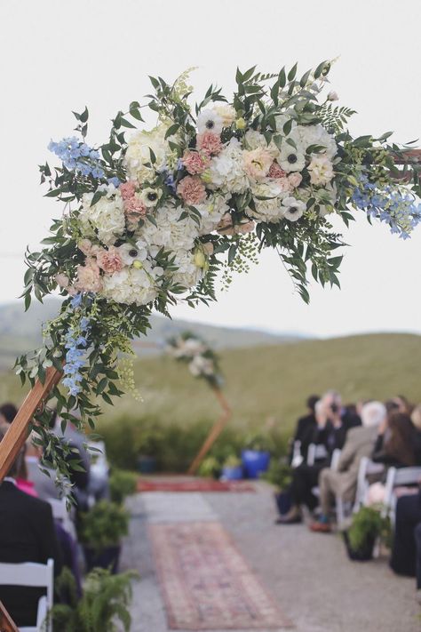 This wedding is complete with an airstream bar, glass hex candles, and an on-point blue and white wedding reception. #Gardenwedding Airstream Bar, Periwinkle Wedding, Wedding Arch Backdrop, Beach Wedding Decorations Reception, White Weddings Reception, Blue Wedding Flowers, Arch Backdrop, Flowers And Greenery, Wedding Flower Arrangements