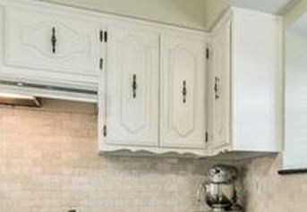 Removing curvy decorative trim under cabinets Adding Trim To Cupboard Doors, Under Cabinet Moldings And Trim, Scalloped Cabinet Trim, How To Fill Grooves In Cabinet Doors, Cabinet Door Decomesh, Quick Kitchen Makeover, Kitchen Cabinets Trim, Cabinet Door Makeover, Gingerbread Trim