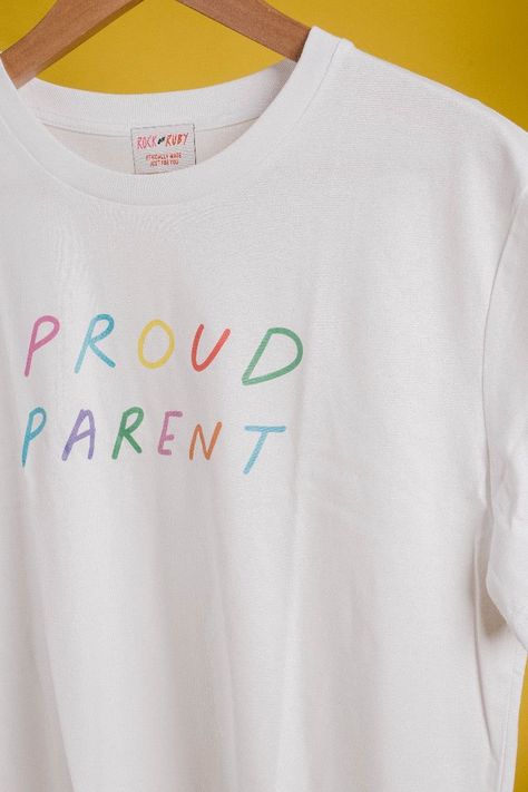 Perfect Pride Parade Outfit! Stand out and show your support with our "PROUD PARENT" rainbow tee. Comfy and stylish for any Pride event. Spread love and equality with this colorful shirt. #gaypride #prideoutfitideas Pride Parade Outfit, Pride T Shirt, Rainbow Tee, Lgbt T Shirts, Slogan T Shirt, Pride Parade, Slogan Tee, Rock On, Pride Tshirts