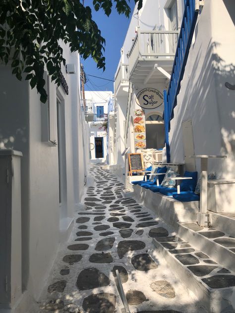 Loving walking through all the beautiful cobblestone streets in Greece! Streets Of Greece, Greece Streets Aesthetic, Greek City Aesthetic, Greek Patio, Greece Buildings, Greece Streets, Greek Streets, Gap Year Travel, Sarah Flint