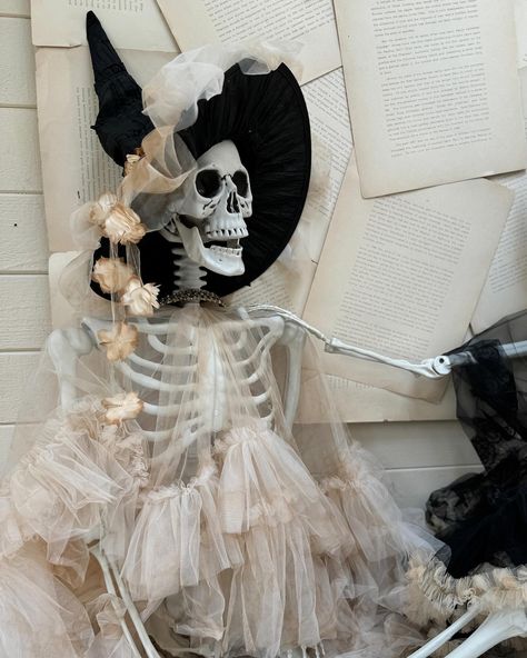 Girls just wanna have fun! 💀 Find these life-size shabby skeletons in our new Halloween line this weekend! #skeleton #chicstyle #skeletonchic #shabbyskeleton #halloweendecor #halloween #falldecor #falldecorations #fallstyle #spooky #notscary #upcoming #halloweenline #frontdoor #feathers #handmade #neutral #neutraldecor #hanging #vintagejewelry #vintagehome #vintagestyle #warlock #deskdecoration #glamskeleton #fancy #vintagebooks #skeletonstyle #brocante #brocantehome Creepy Chic Halloween Decor, Lace Halloween Decor, Glam Skeleton, Skeleton Fairy Cloche, Shabby Chic Halloween, Shabby Chic Pumpkins, Shabby Chic Violin, Girls Just Wanna Have Fun, Classy Halloween