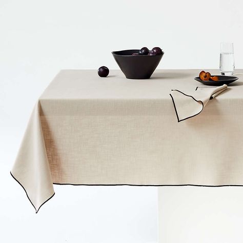 Mercer Merrow-Stitch Warm Natural Organic Cotton Tablecloth + Reviews | Crate & Barrel Modern Tablecloths, Colorful Dinnerware, White Table Cloth, Black Embroidery, Dining Table Black, Cotton Tablecloths, Dining Room Living Room, No Matter How, Organic Modern